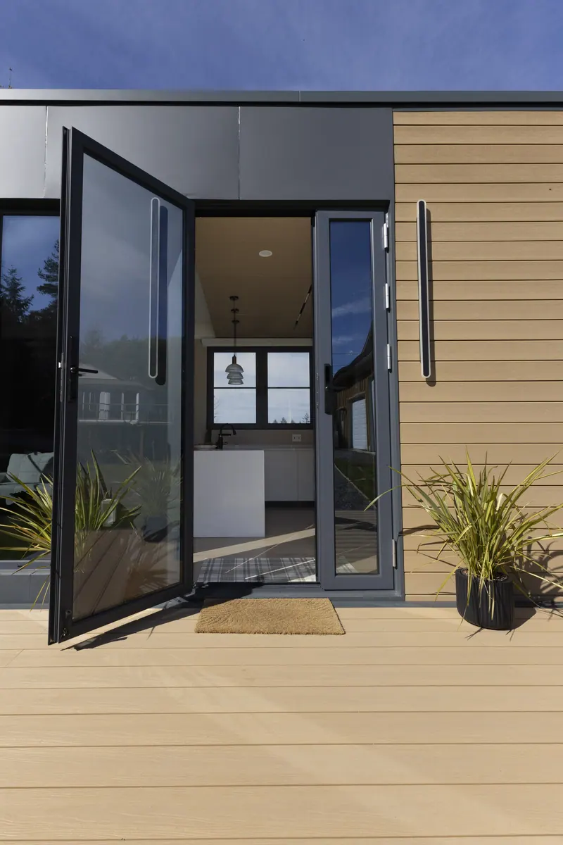 The open front door of a Cueva show home, looking through to the kitchen