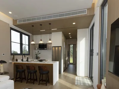 The long ceiling vent of the central ducted heat pump above the Solace kitchen